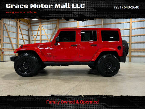 2018 Jeep Wrangler JK Unlimited for sale at Grace Motor Mall LLC in Traverse City MI