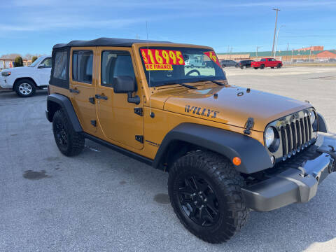 2014 Jeep Wrangler Unlimited for sale at Suarez Auto Sales in Port Huron MI