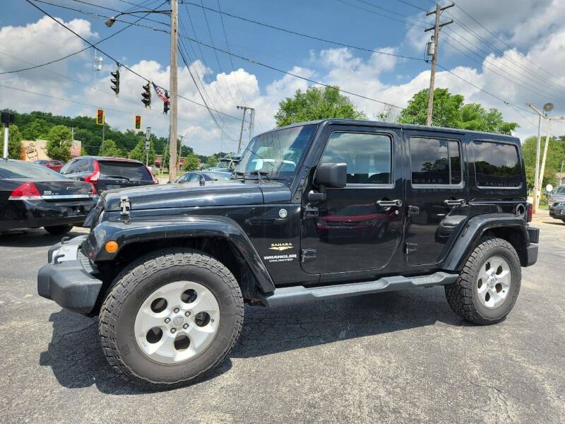 2014 Jeep Wrangler Unlimited for sale at COLONIAL AUTO SALES in North Lima OH