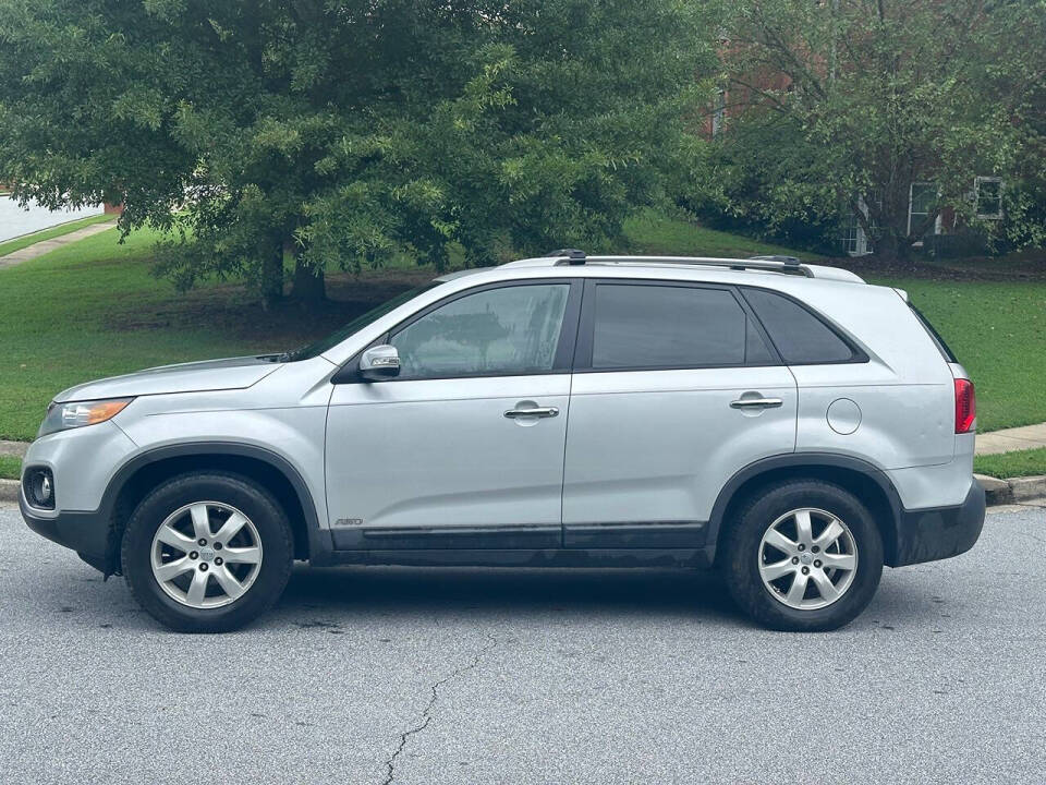 2012 Kia Sorento for sale at SHURE AUTO SALES in Snellville, GA