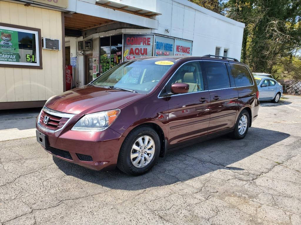 2010 Honda Odyssey for sale at DAGO'S AUTO SALES LLC in Dalton, GA