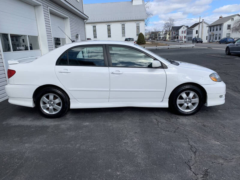 2008 Toyota Corolla for sale at VILLAGE SERVICE CENTER in Penns Creek PA
