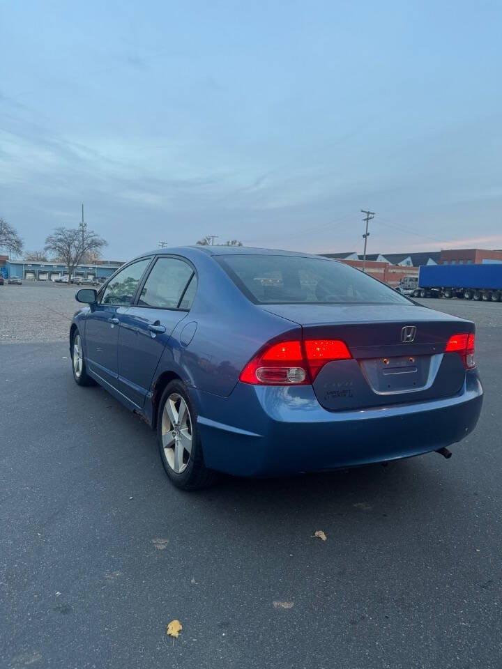 2006 Honda Civic for sale at H & H AUTO GROUP in Detroit, MI