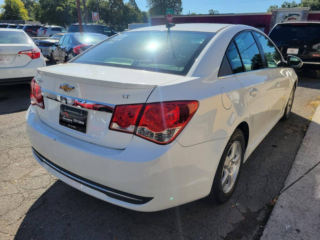 2013 Chevrolet Cruze for sale at DAGO'S AUTO SALES LLC in Dalton, GA