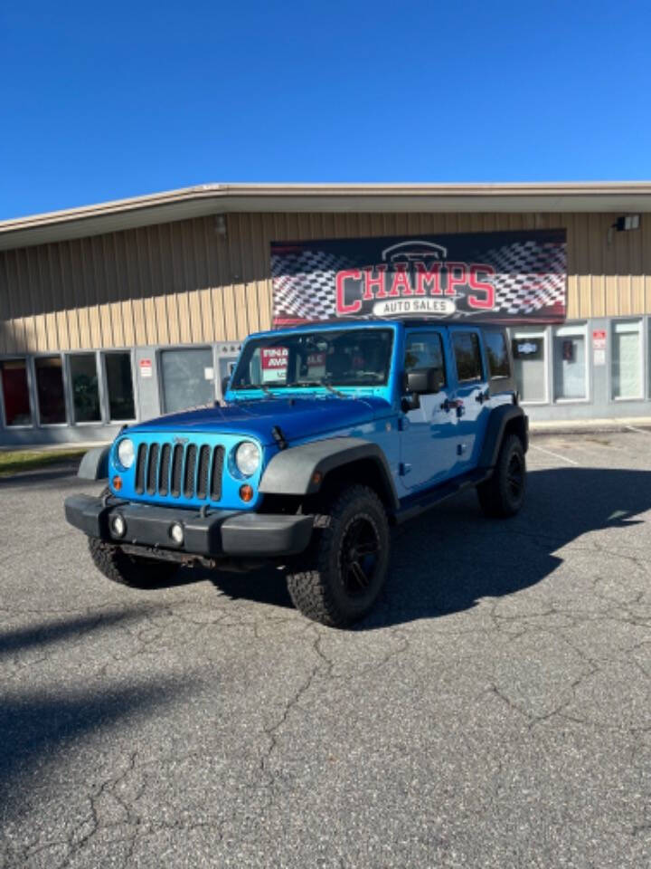 2010 Jeep Wrangler Unlimited for sale at Champs Auto Sales in Petersburg, VA