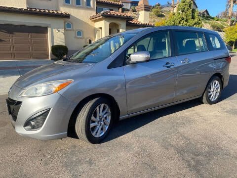 2014 Mazda MAZDA5 for sale at CALIFORNIA AUTO GROUP in San Diego CA