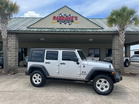 2009 Jeep Wrangler Unlimited for sale at Rabeaux's Auto Sales in Lafayette LA