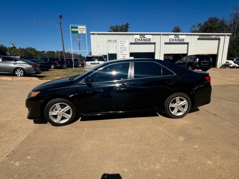 2013 Toyota Camry for sale at Good Cars and Trucks Wholesale, LLC in Crystal Springs, MS