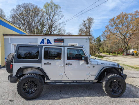 2012 Jeep Wrangler Unlimited for sale at A&A Auto Sales llc in Fuquay Varina NC
