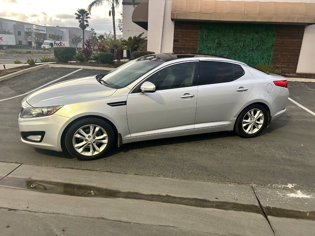 2013 Kia Optima for sale at STM AUTO GROUP LLC in Corona, CA