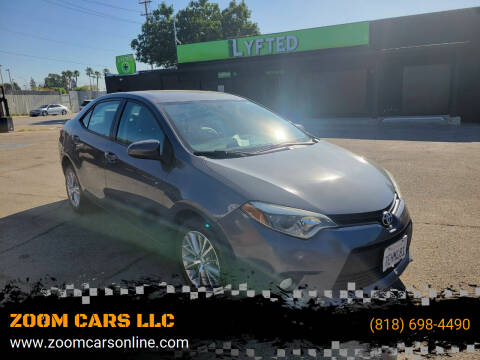 2014 Toyota Corolla for sale at ZOOM CARS LLC in Sylmar CA