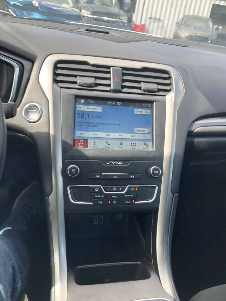 2019 Ford Fusion Hybrid  - $15,500
