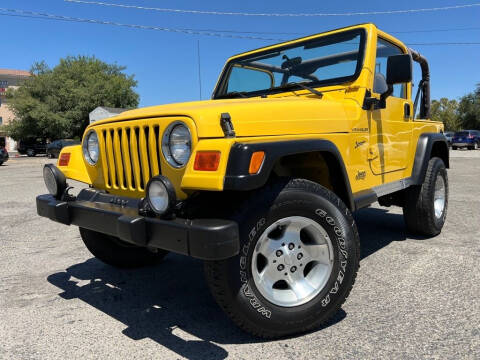 2002 Jeep Wrangler for sale at Auto Mercado in Clovis CA