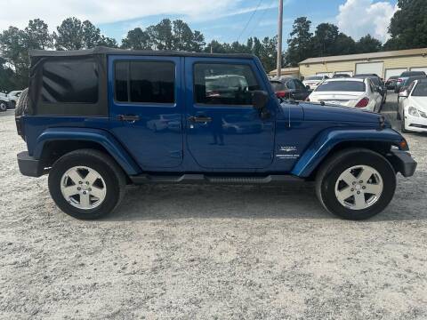 2009 Jeep Wrangler Unlimited for sale at Gwinnett Luxury Motors in Buford GA