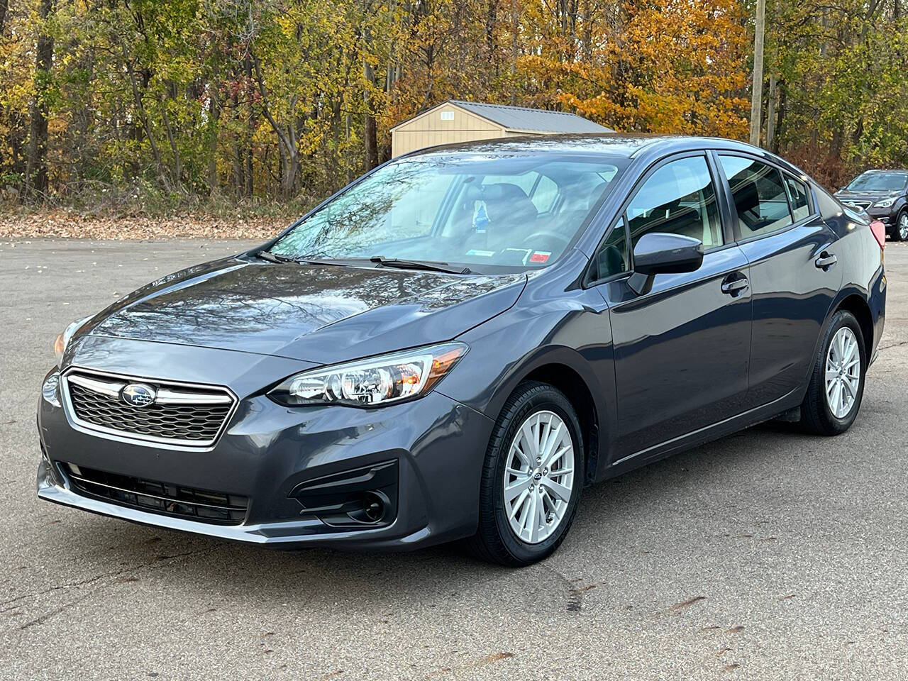 2017 Subaru Impreza for sale at Spartan Elite Auto Group LLC in Lansing, MI