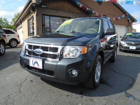 2008 Ford Escape Hybrid for sale at IBARRA MOTORS INC in Berwyn IL