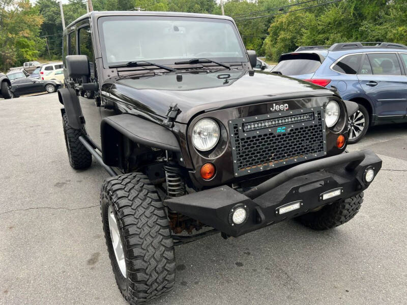 2013 Jeep Wrangler Unlimited for sale at Dracut's Car Connection in Methuen MA