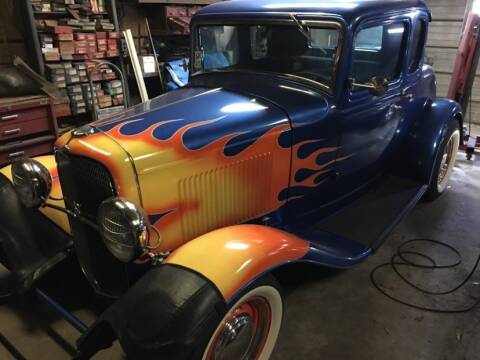 1932 Ford 5 window coupe for sale at Marshall Motors Classics in Jackson MI
