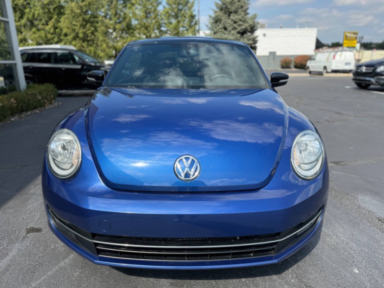 2013 Volkswagen Beetle for sale at Opus Motorcars in Utica, MI