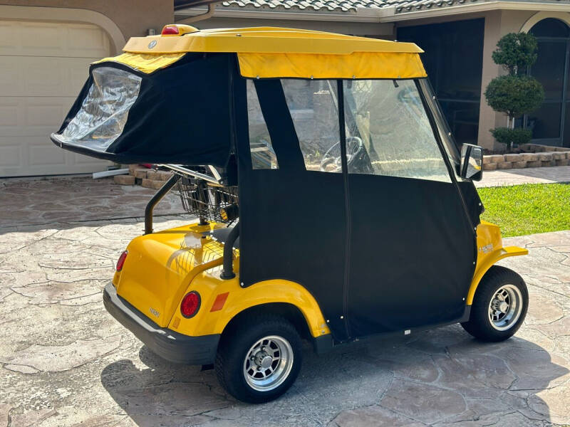 2010 TOMBERLIN E-MERGE GOLF CART