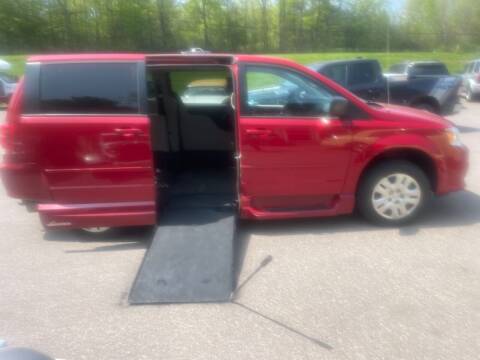 2014 Dodge Grand Caravan for sale at Hartley Auto Sales & Service in Milton VT