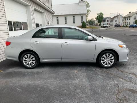 2013 Toyota Corolla for sale at VILLAGE SERVICE CENTER in Penns Creek PA