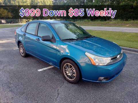 2010 Ford Focus for sale at WIGGLES AUTO SALES INC in Mableton GA