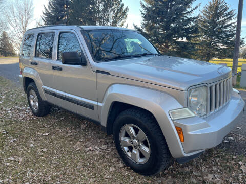 2012 Jeep Liberty for sale at BELOW BOOK AUTO SALES in Idaho Falls ID