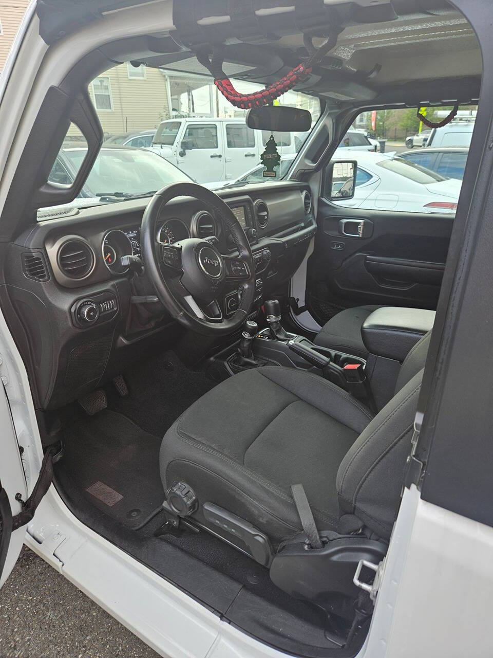 2020 Jeep Wrangler for sale at RENOS AUTO SALES LLC in Waterbury, CT