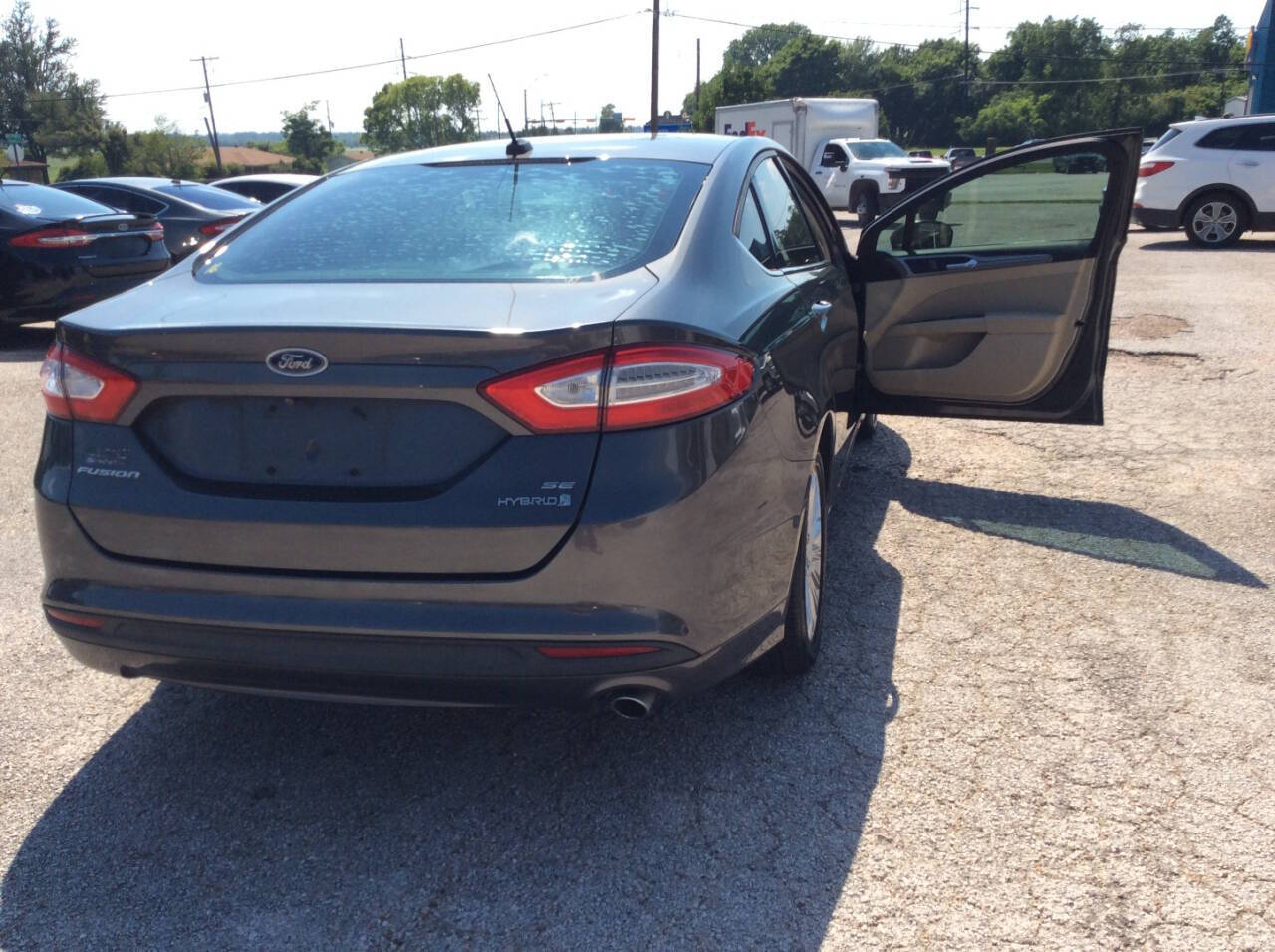 2016 Ford Fusion Hybrid for sale at SPRINGTIME MOTORS in Huntsville, TX