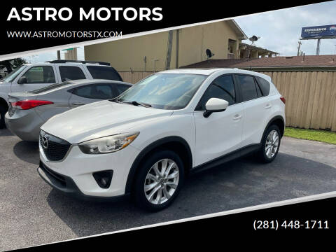 2013 Mazda CX-5 for sale at ASTRO MOTORS in Houston TX