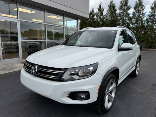 2014 Volkswagen Tiguan for sale at Opus Motorcars in Utica, MI