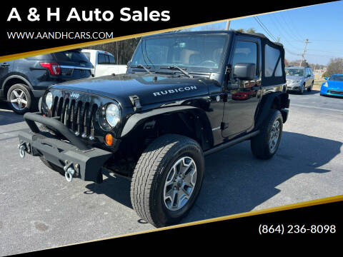 2013 Jeep Wrangler for sale at A & H Auto Sales in Greenville SC