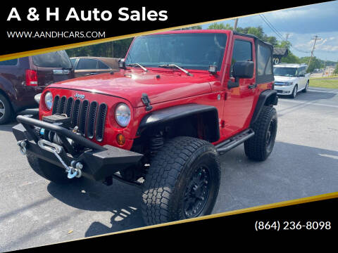 2012 Jeep Wrangler for sale at A & H Auto Sales in Greenville SC