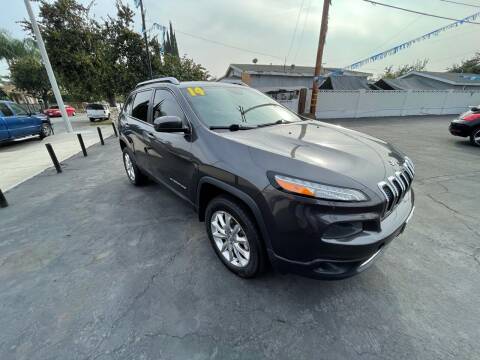 2014 Jeep Cherokee for sale at ROMO'S AUTO SALES in Los Angeles CA