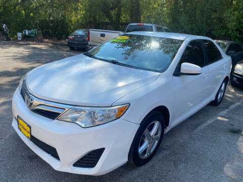 2012 Toyota Camry for sale at AUTO LATINOS CAR in Houston TX