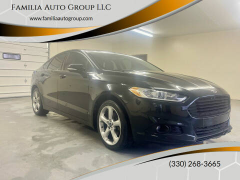 2014 Ford Fusion for sale at Familia Auto Group LLC in Massillon OH