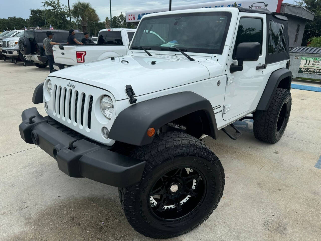 2014 Jeep Wrangler for sale at DJA Autos Center in Orlando, FL