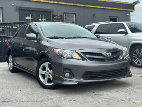 2013 Toyota Corolla for sale at Road King Auto Sales in Hollywood FL