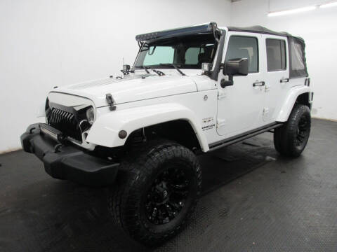 2016 Jeep Wrangler Unlimited for sale at Automotive Connection in Fairfield OH