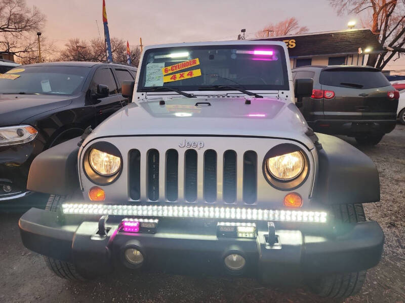 2009 Jeep Wrangler Unlimited for sale at ROCKET AUTO SALES in Chicago IL