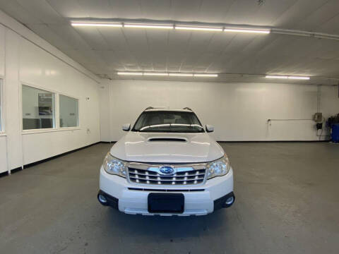 2013 Subaru Forester for sale at Icon Auto Group in Lake Odessa MI