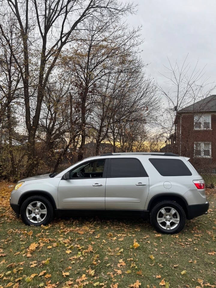 2011 GMC Acadia for sale at H & H AUTO GROUP in Detroit, MI