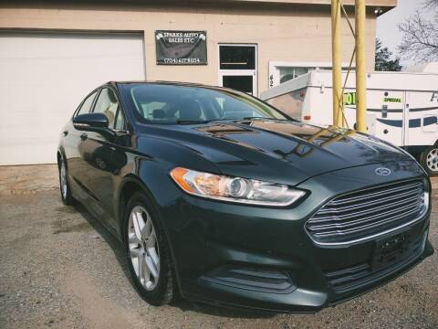 2015 Ford Fusion for sale at Sparks Auto Sales Etc in Alexis NC