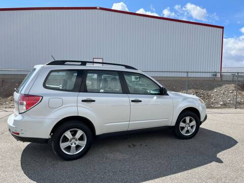 2011 Subaru Forester for sale at BELOW BOOK AUTO SALES in Idaho Falls ID