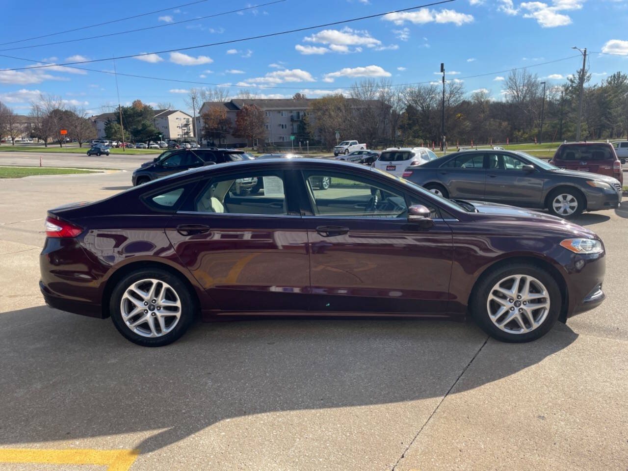 2013 Ford Fusion for sale at Martinson's Used Cars in Altoona, IA