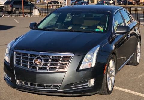 2013 Cadillac XTS for sale at MAGIC AUTO SALES in Little Ferry NJ