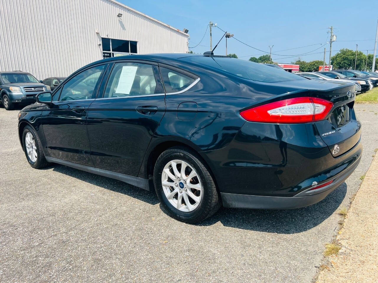 2014 Ford Fusion for sale at CAR FARMER & SALES in Chesapeake, VA