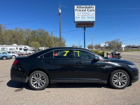 2014 Ford Taurus for sale at AFFORDABLY PRICED CARS LLC in Mountain Home ID