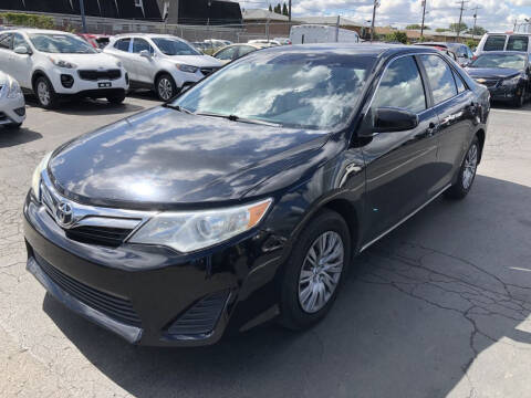 2012 Toyota Camry for sale at Auto Palace Inc in Columbus OH